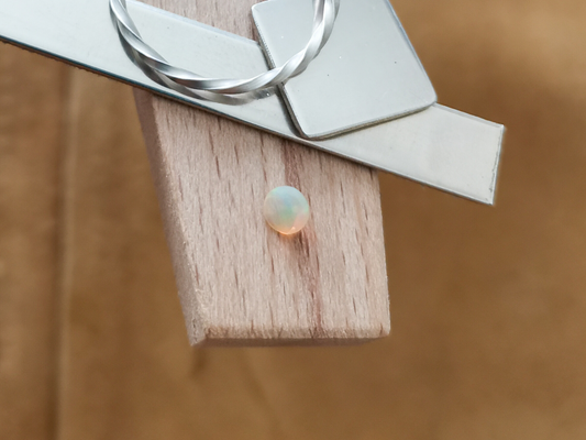 Faceted Round Opal - 4mm - 0.14 ct