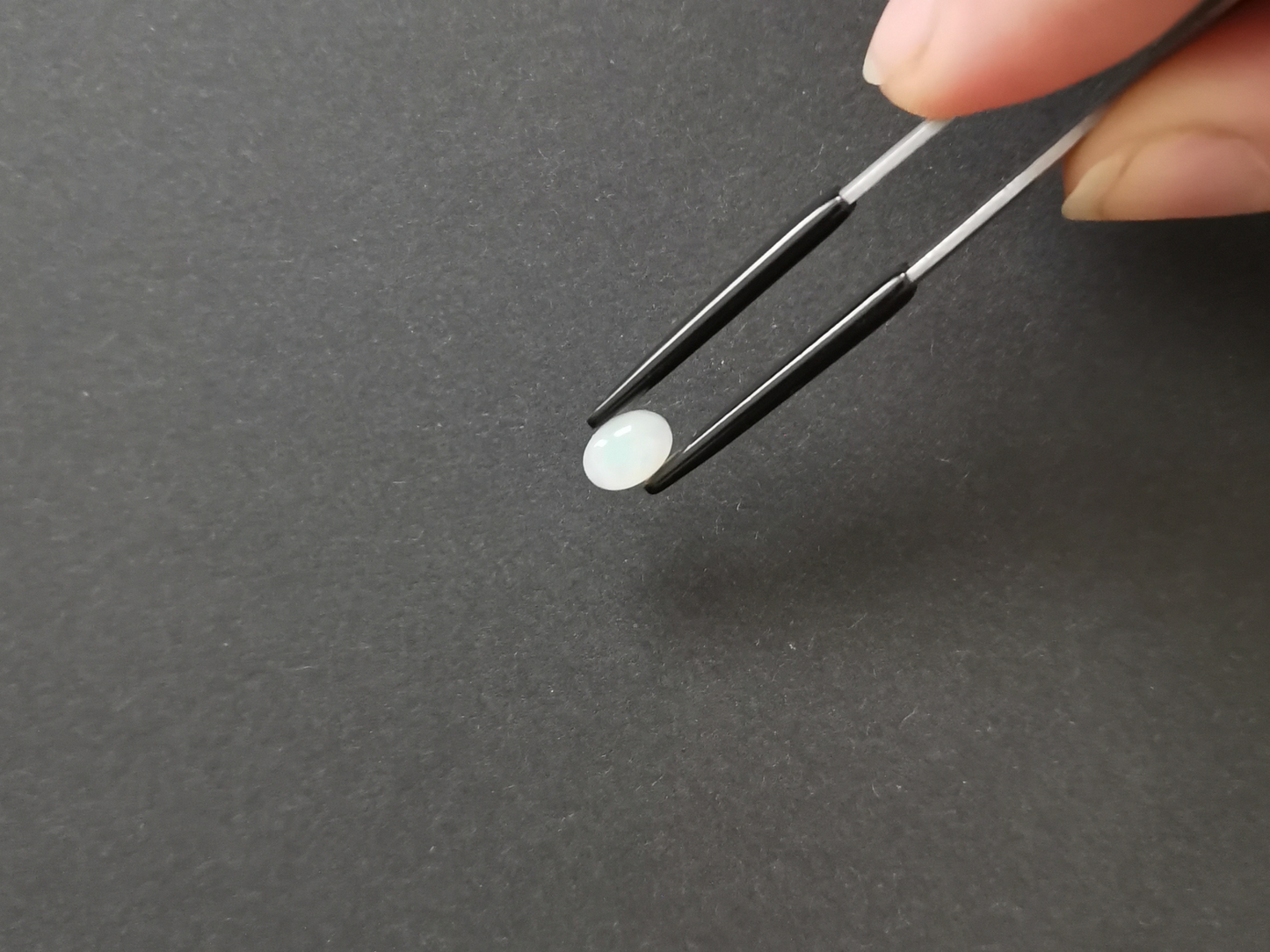 Opal Oval Cabochon - 6.96mm by 5.01mm - 0.55 ct