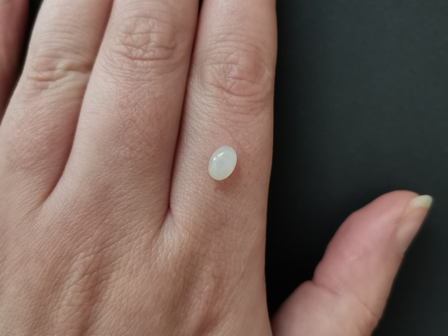 Opal Oval Cabochon - 6.96mm by 5.01mm - 0.55 ct